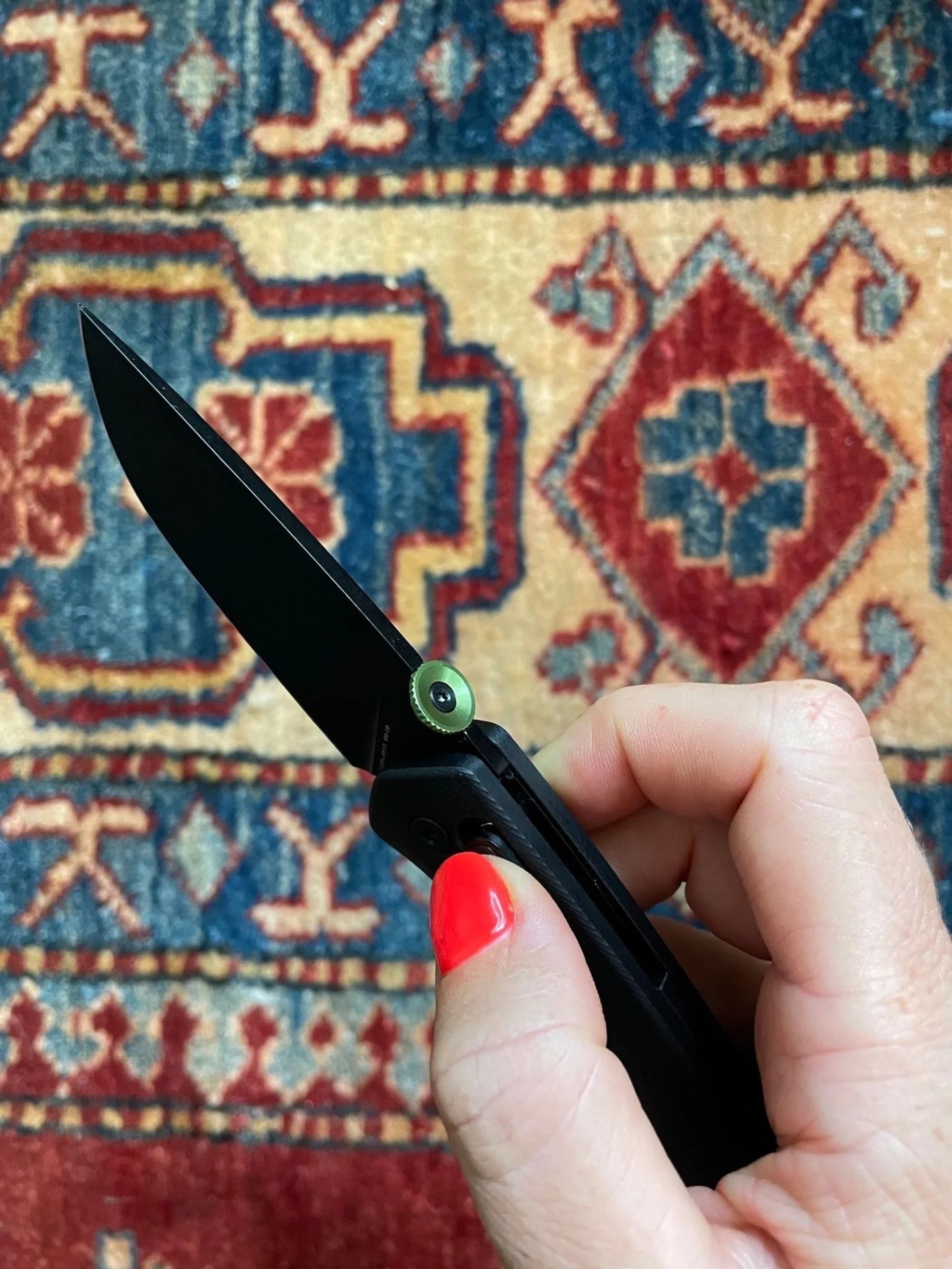 woman holding the carter knife