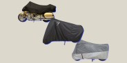 three motorcycles with covers on