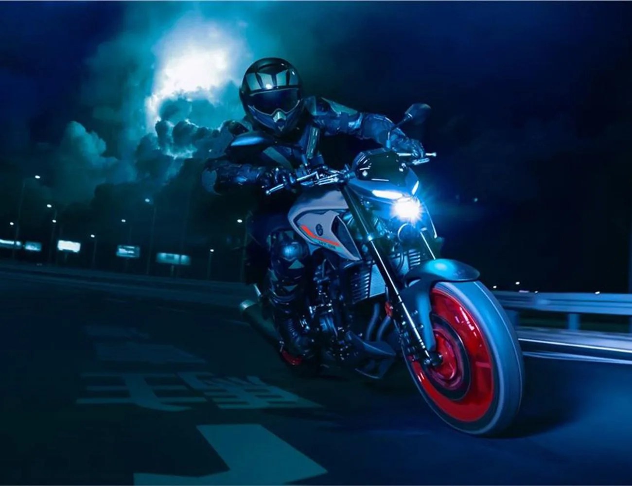 person riding yamaha motorcycle