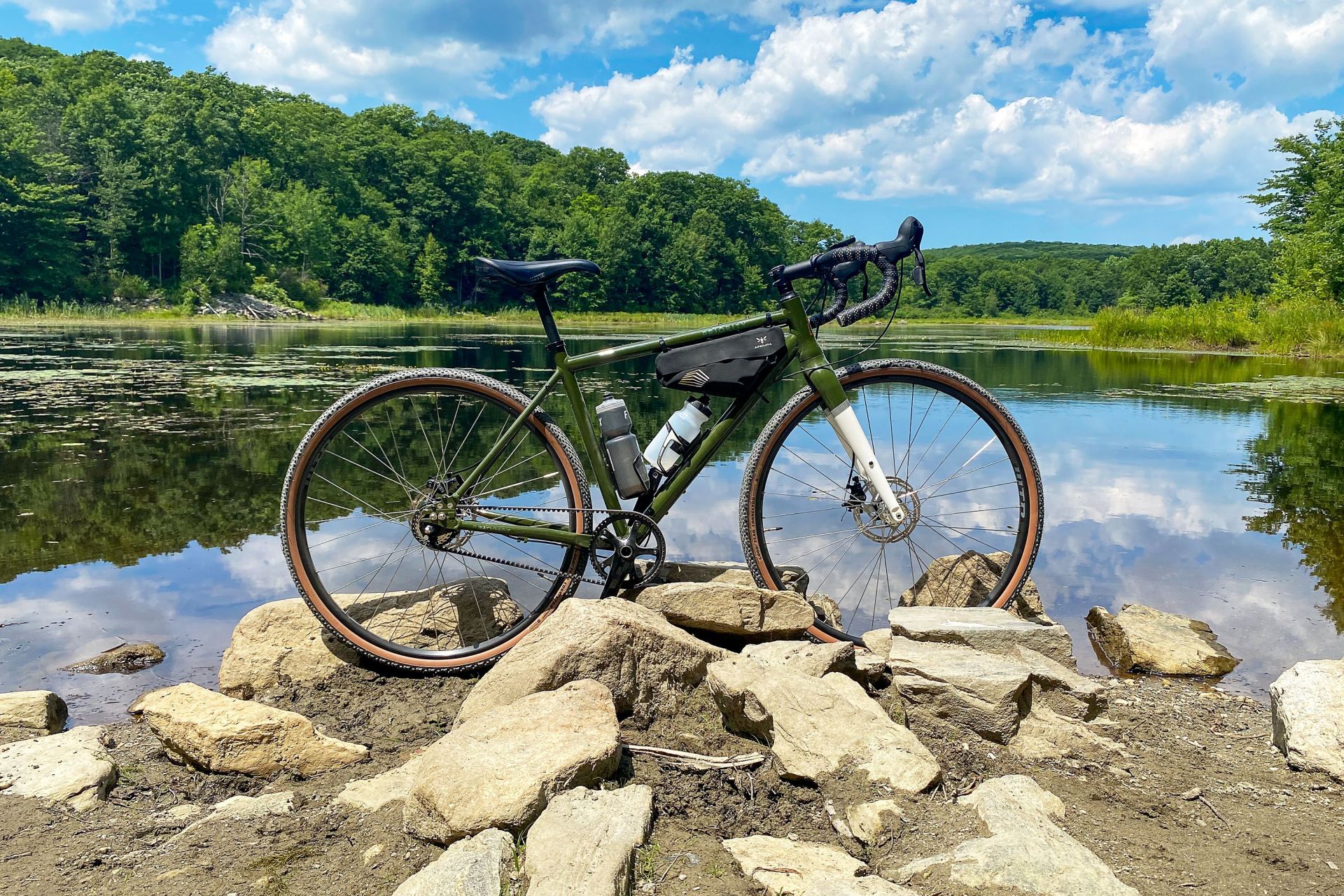 priority apollo bike next to a pond