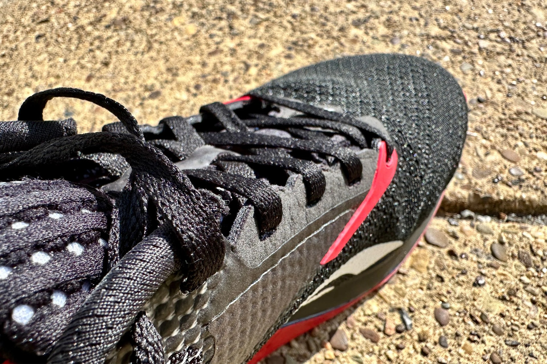 close up of the toe and laces on a reebok shoe