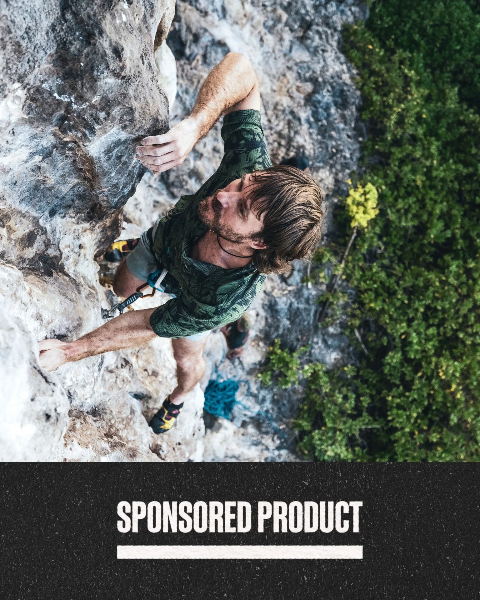sponsored product man climbing cliffside wearing roark bless up breathable stretch shirt