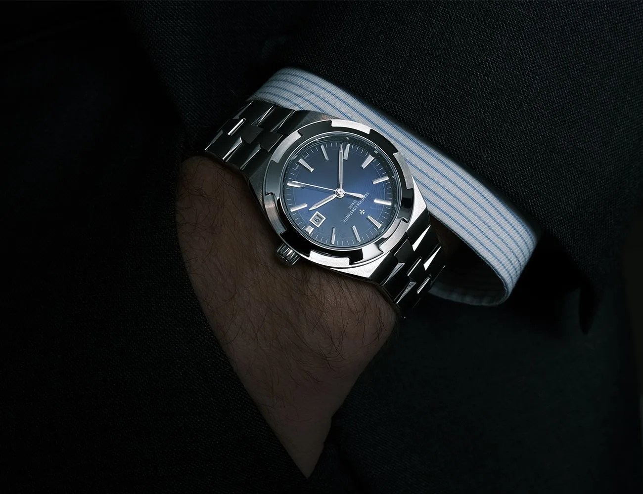 a man wearing a watch on his wrist
