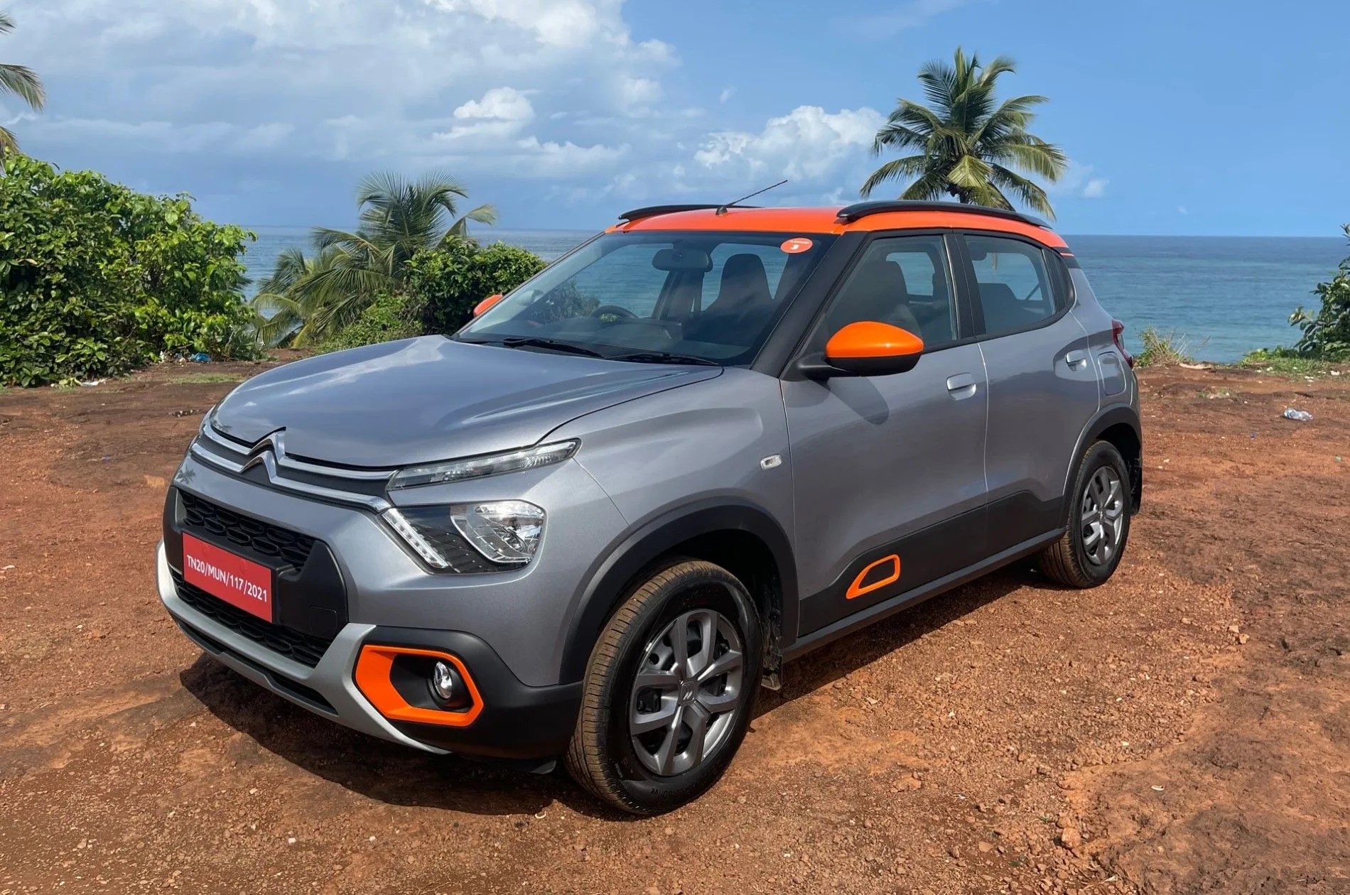 citroen c3 on a cliff overlooking the ocean