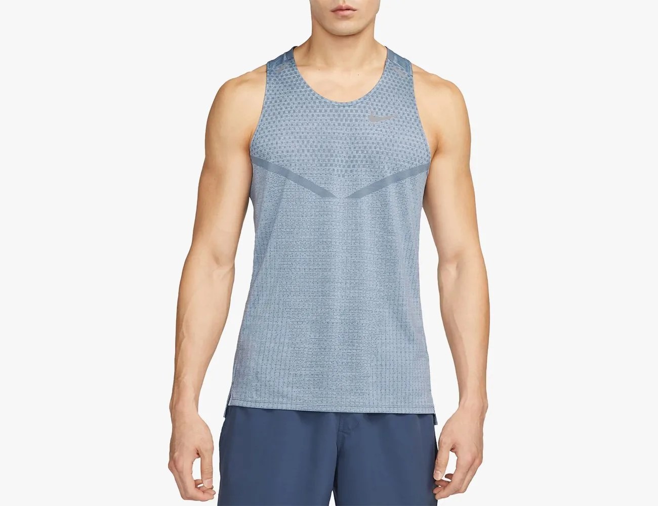 a man wearing a tank top shirt