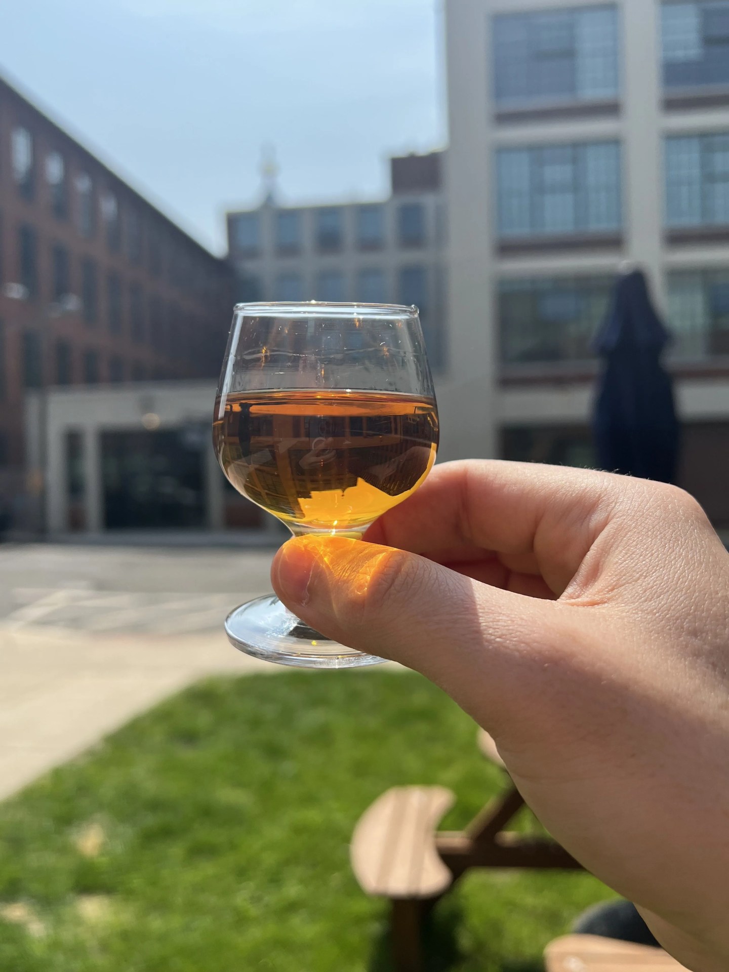a tasting glass filled with buffalo trace experimental peated bourbon