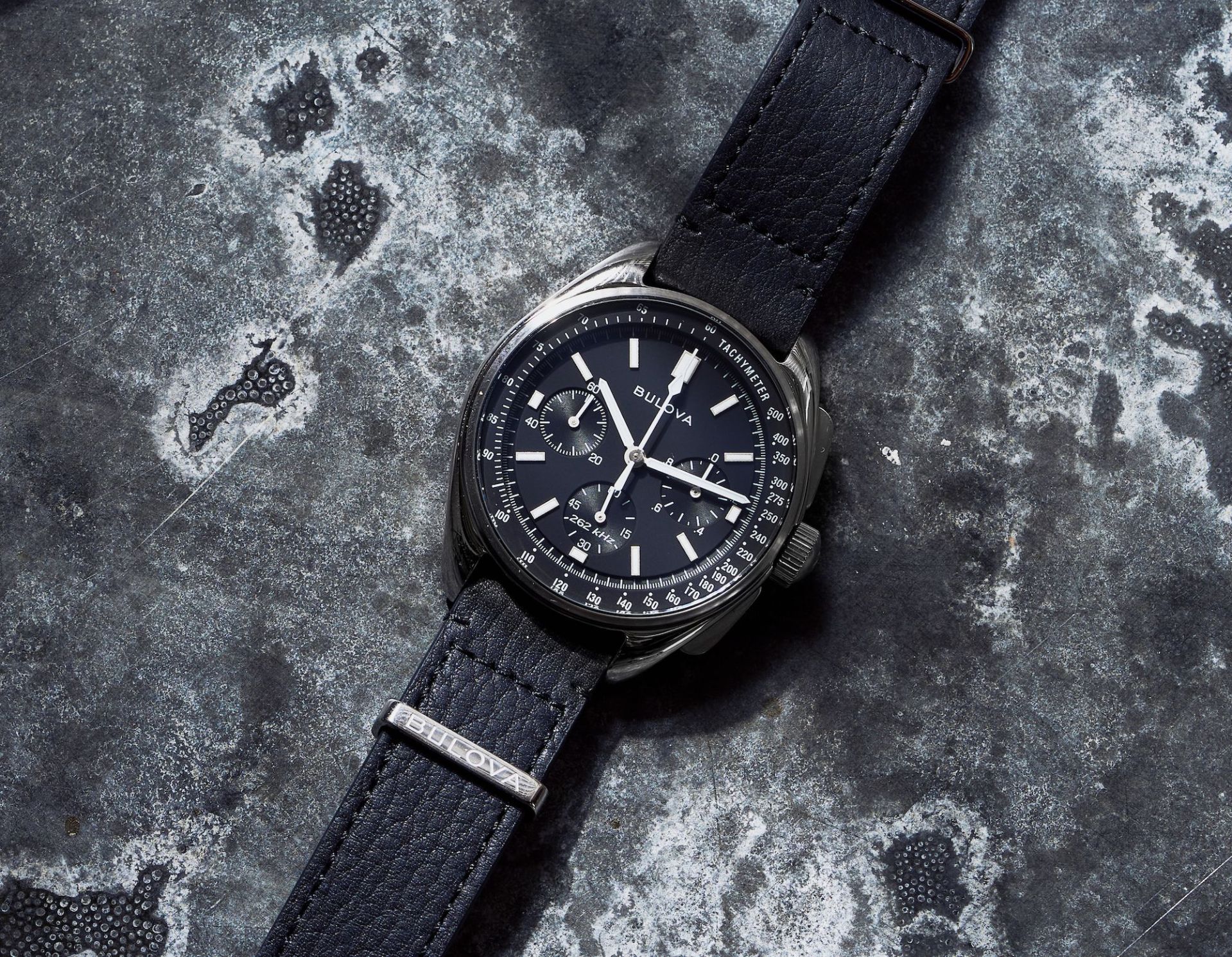 chronograph watch on marble surface