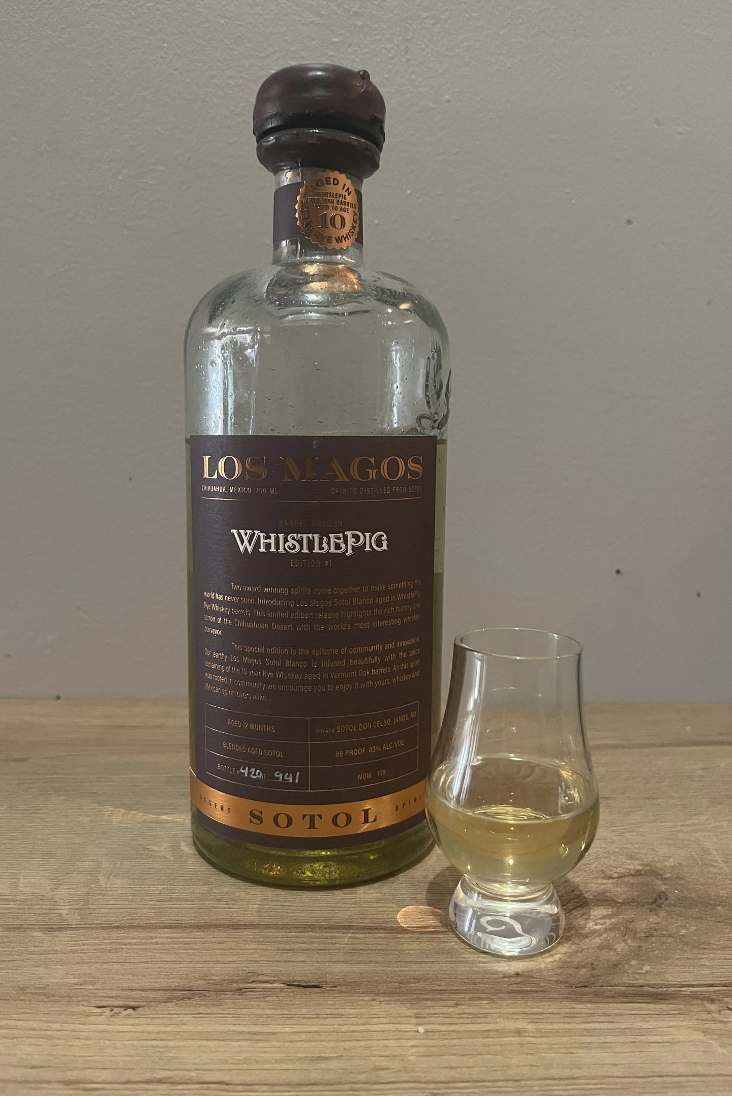 los magos sotol whistlepig edition bottle and glass
