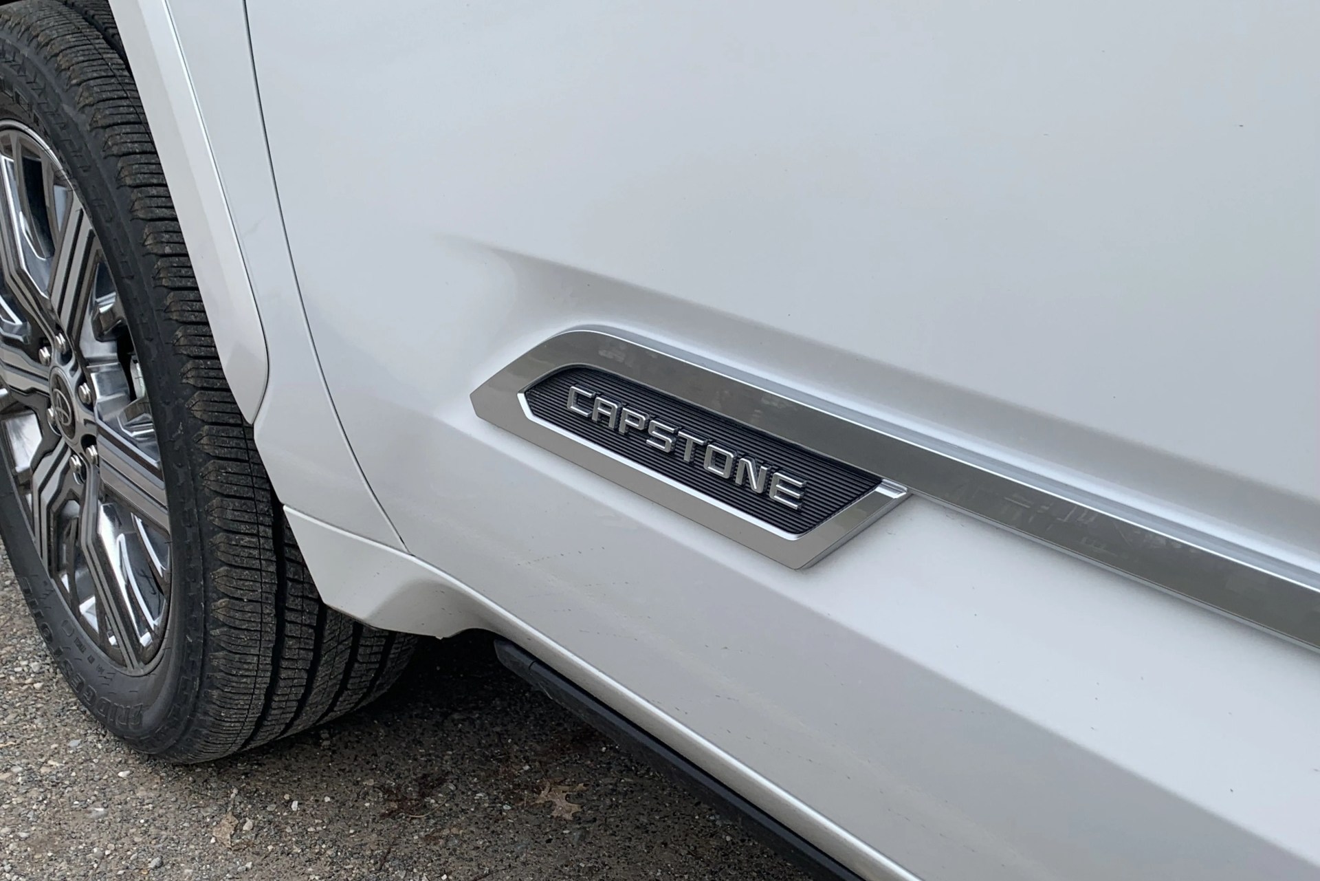 toyota tundra front door driver's side showing capstone badging