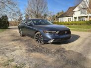 honda accord touring hybrid parked on the street