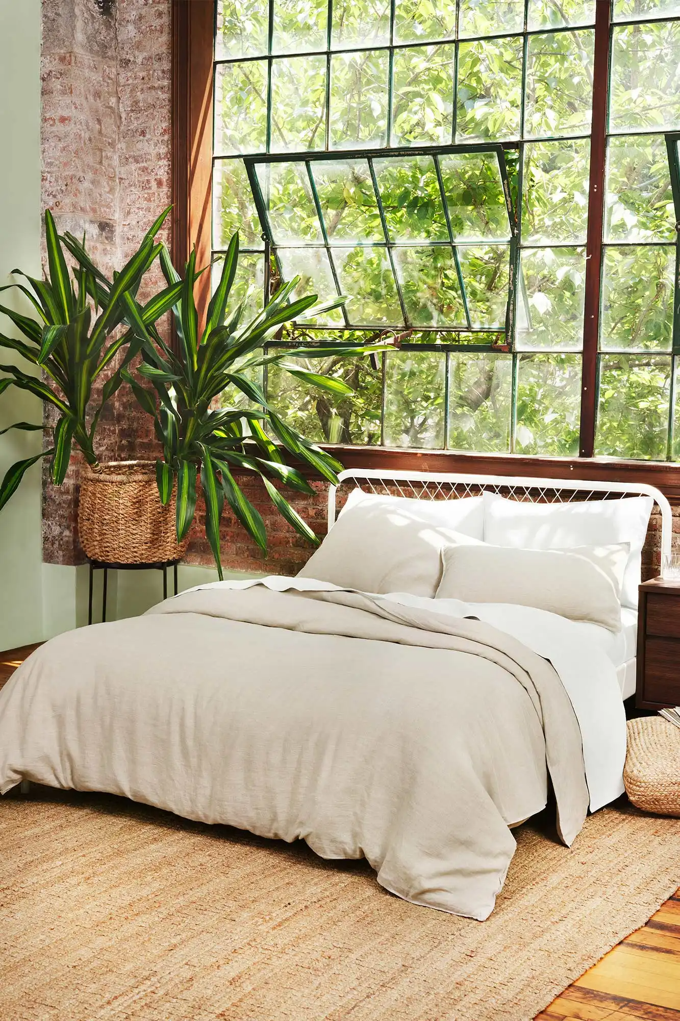 bed with linen duvet