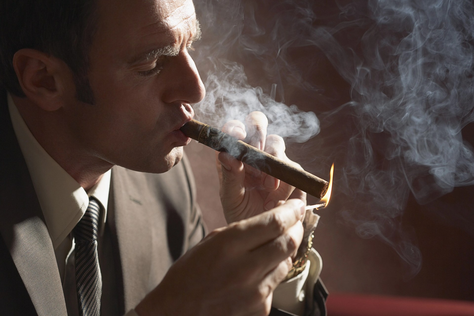 man smoking cigar