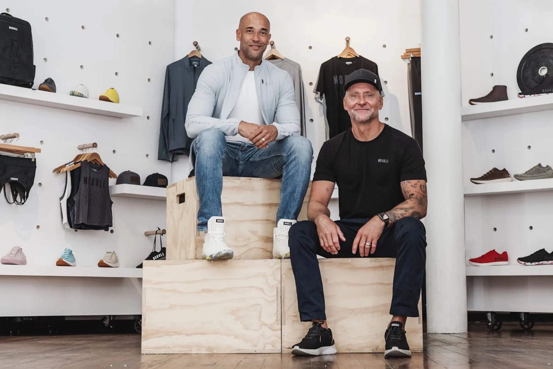 two men sitting in a store