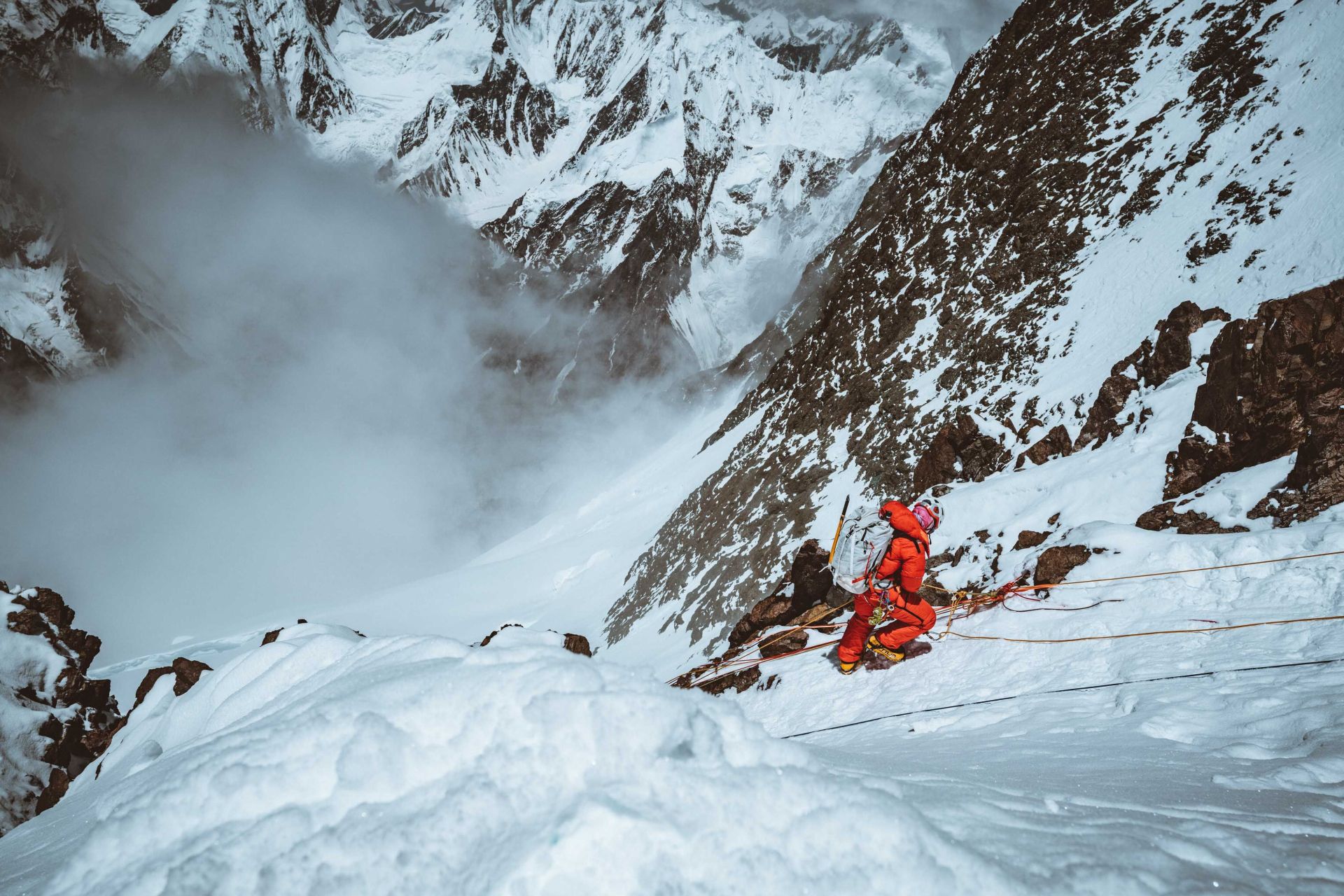 the north face womens himalayan suit in action