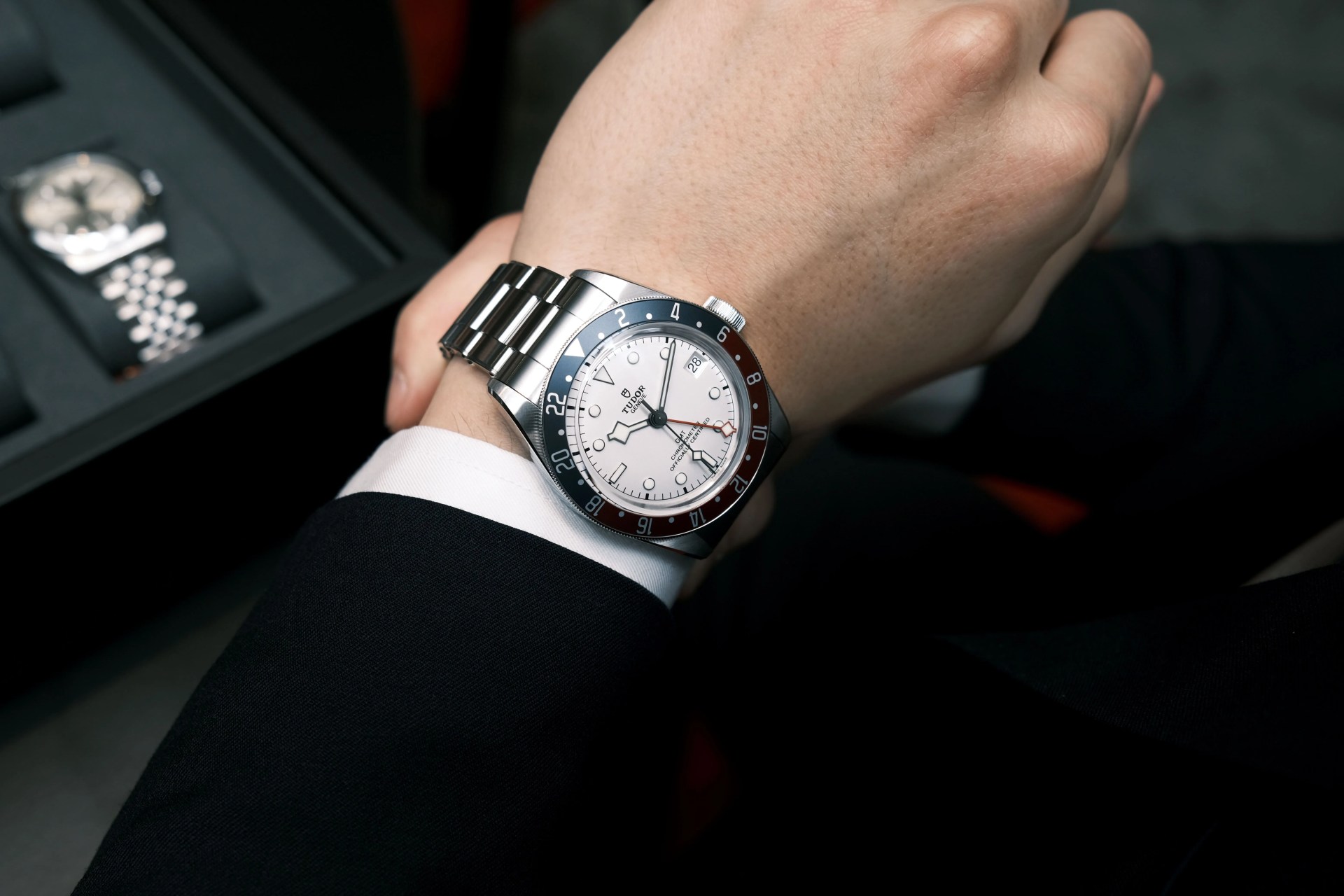 tudor gmt watch with white dial on a wrist