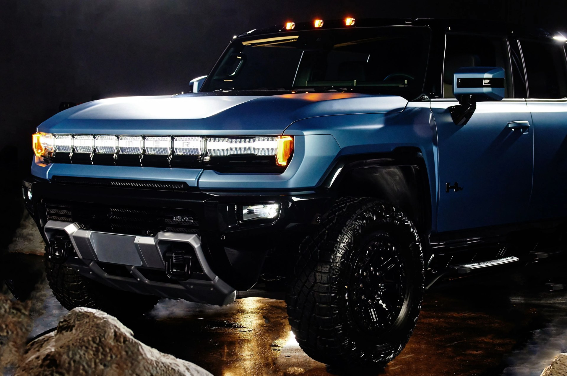 2024 gmc hummer ev omega edition suv featuring exclusive neptune blue matte exterior color and blacked out accents