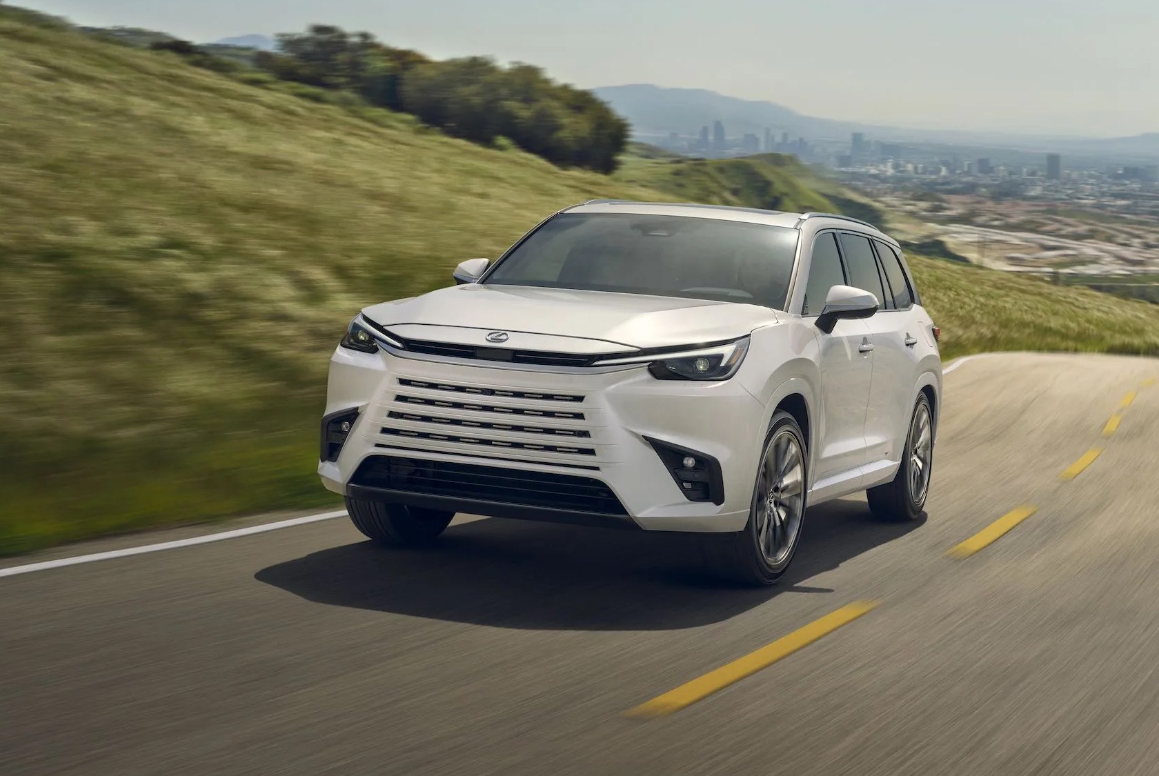 lexus tx crossover driving on road