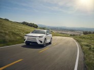 lexus tx crossover driving on road