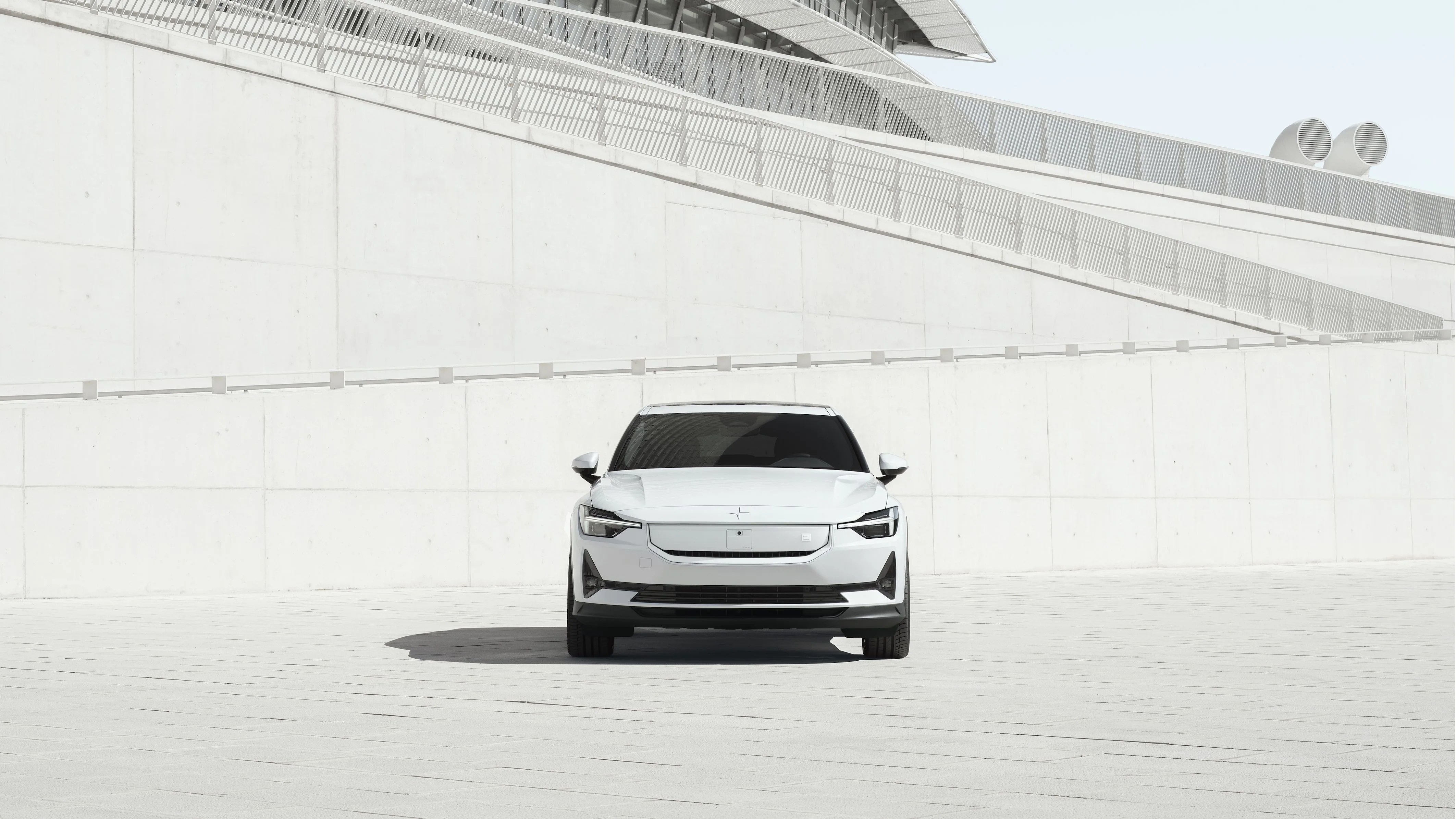 polestar 2 in front of a white wall