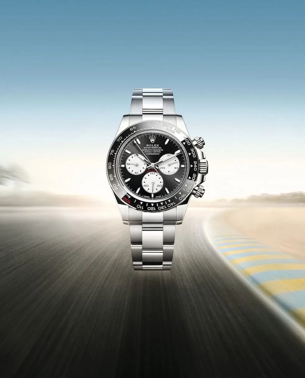 Rolex Daytona Le Mans hovering over blurred racetrack