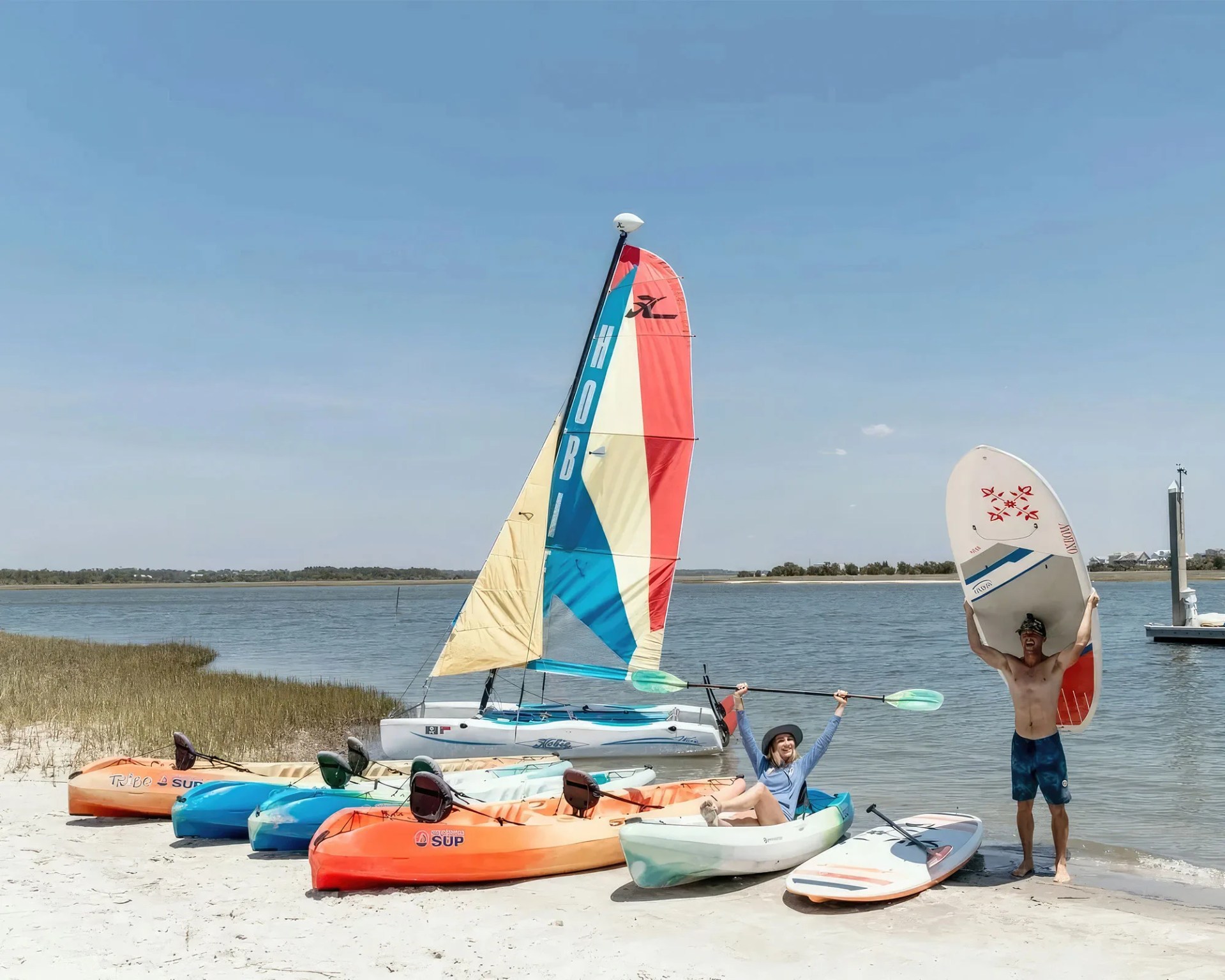 people by ocean with SUP