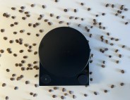 the fellow tally pro coffee scale surrounded by coffee beans