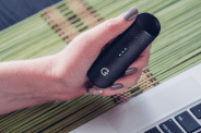 a hand holding the g pen dash vape