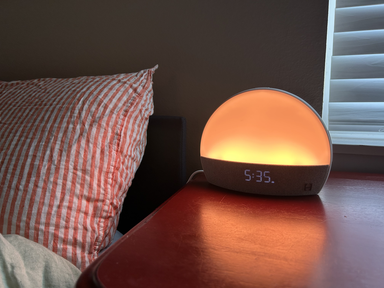 hatch alarm clock on night stand