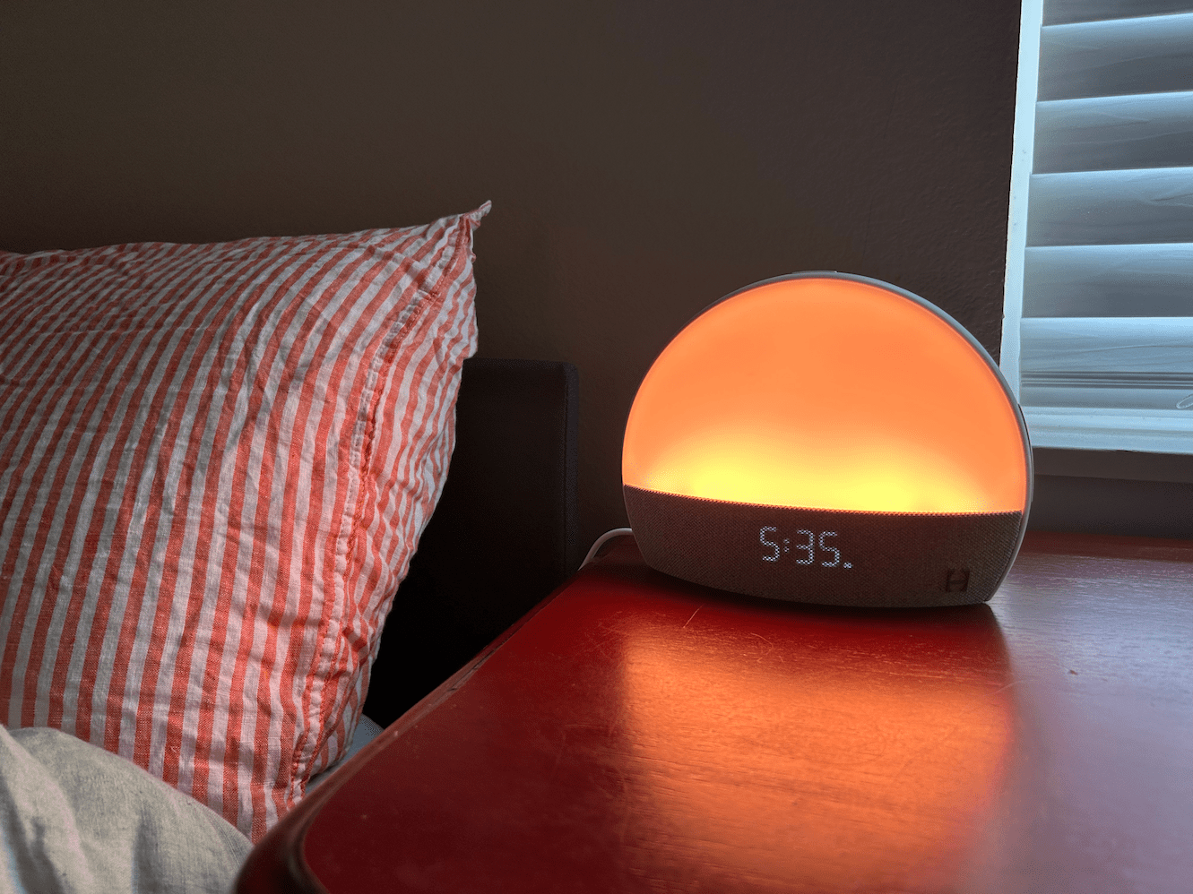 hatch alarm clock on night stand