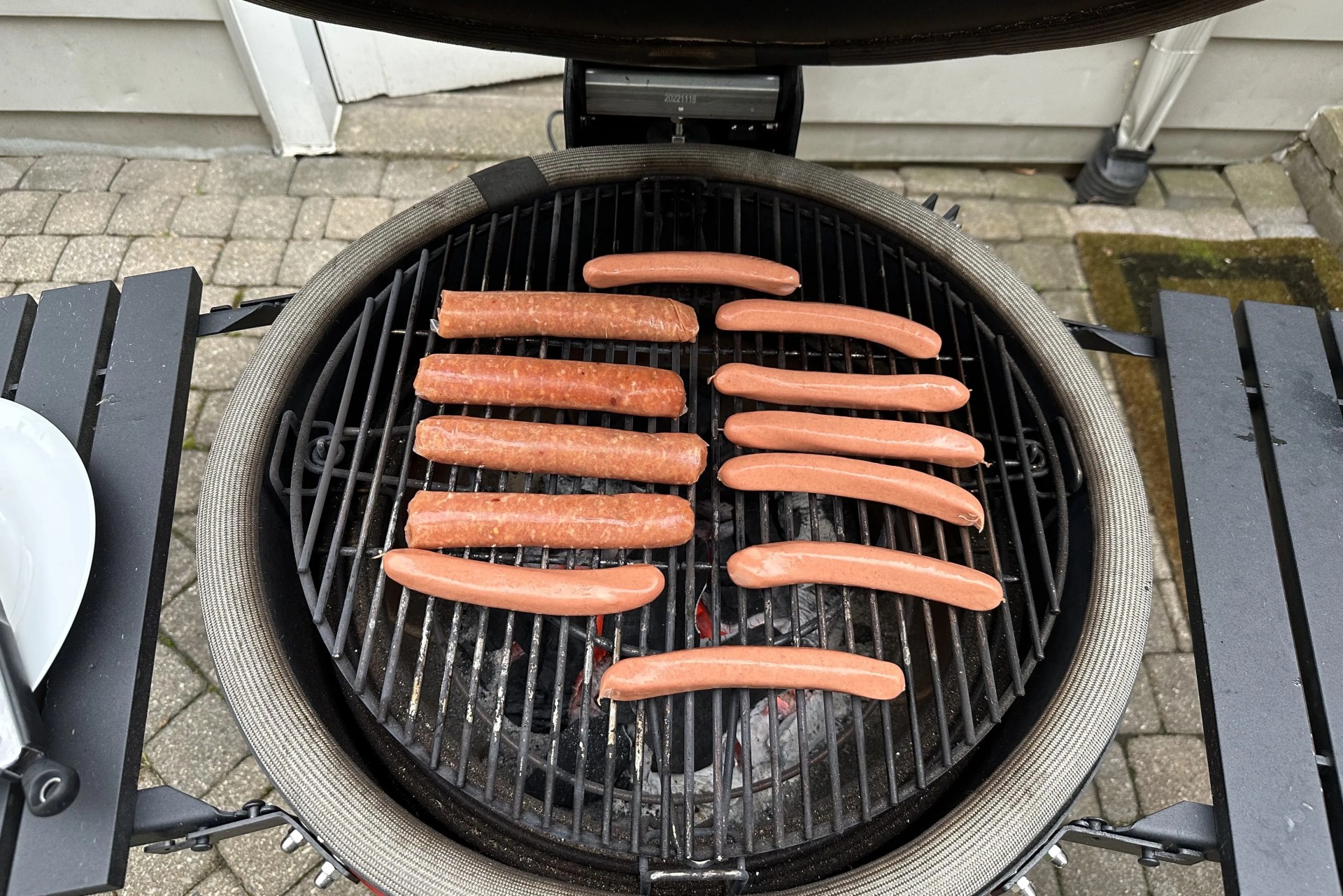sausages and hot dogs on kamado joe grill