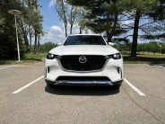 mazda cx90 parked in a parking lot