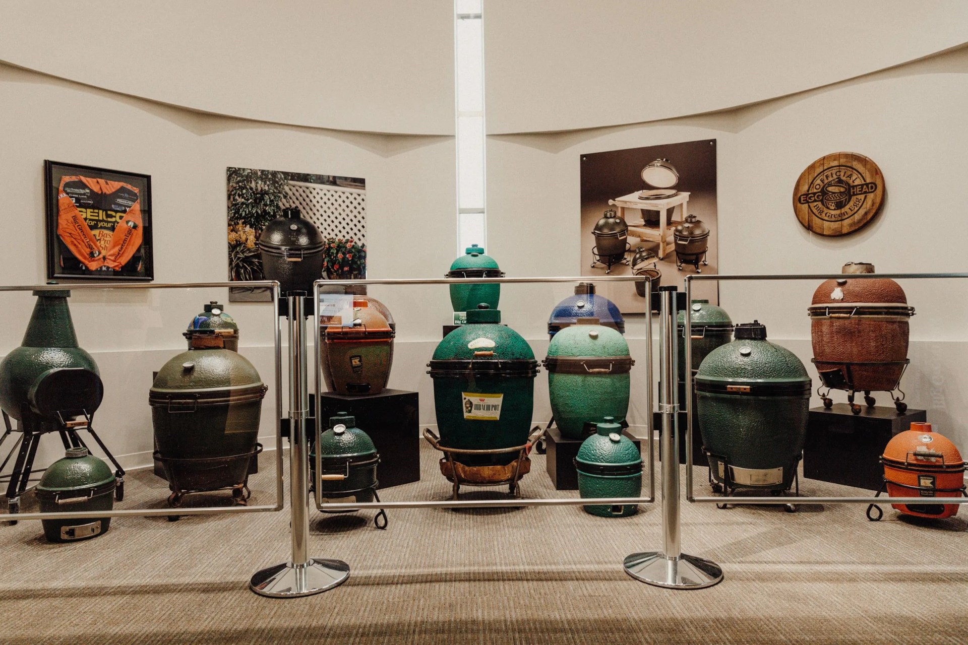 vintage kamado grills on display at the big green egg headquarters