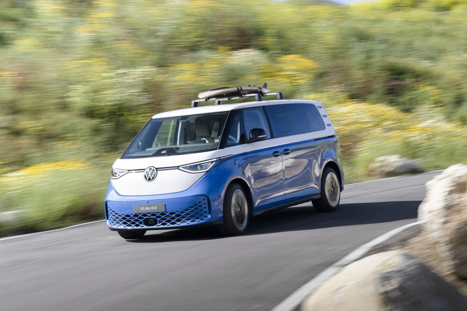 volkswagen id buzz rounding a corner