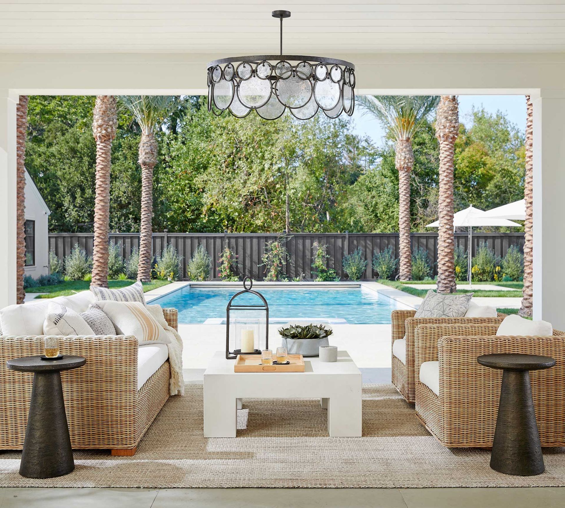 patio furniture outside on next to a pool