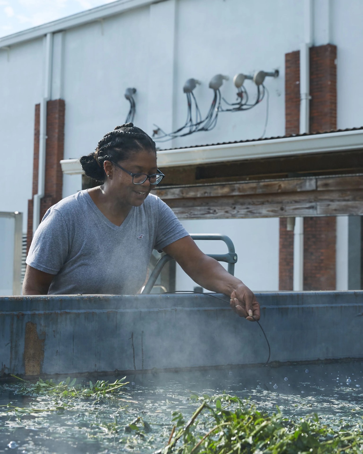 a woman working at an indigo factory