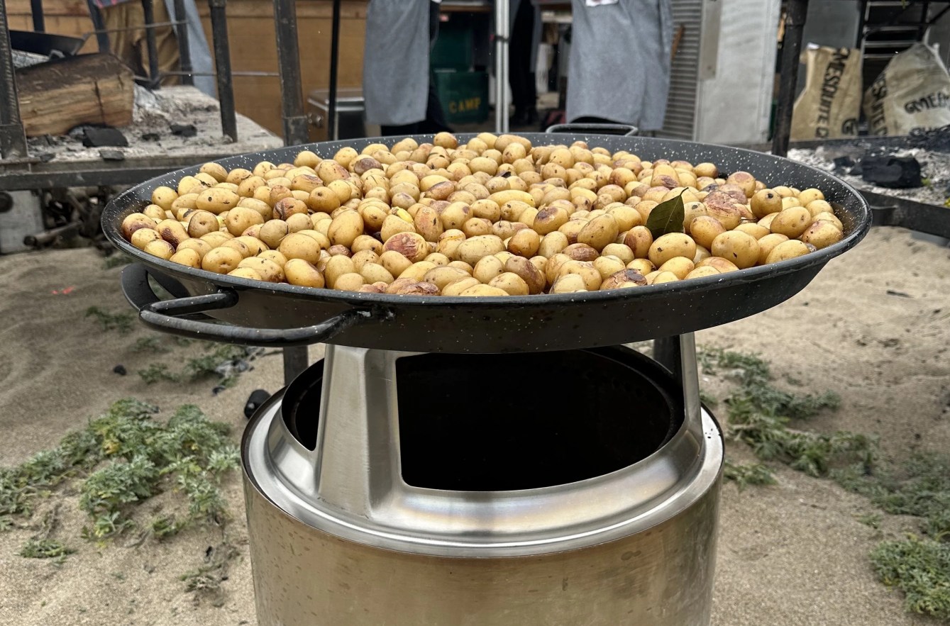 potatoes warming on a solo stove