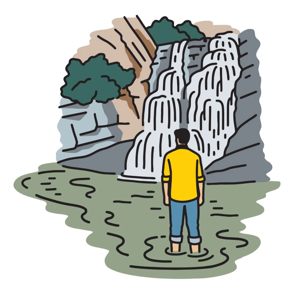 man standing in water