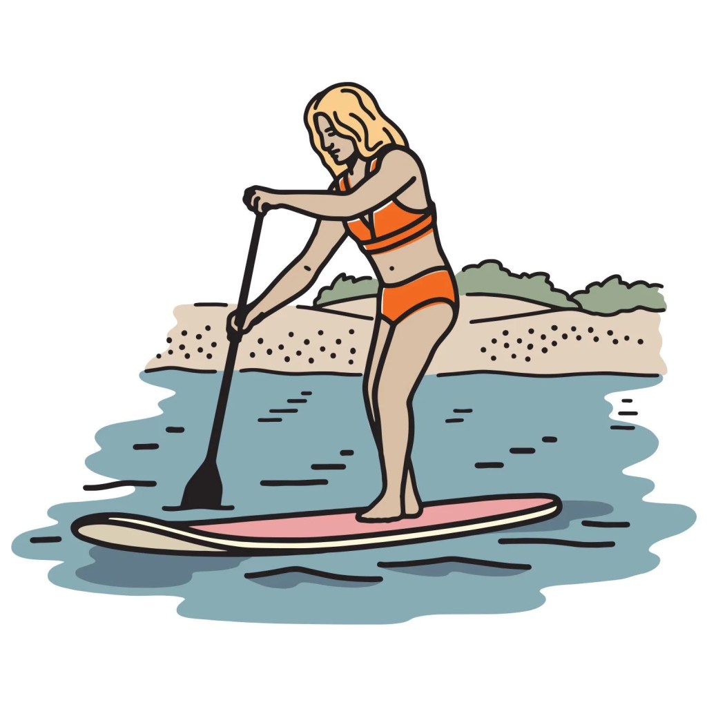 woman paddle boarding on lake