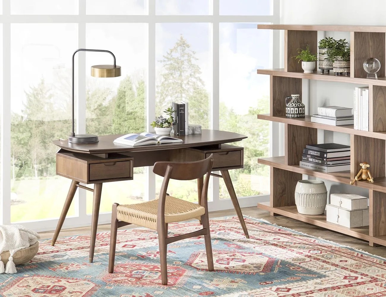 an office with floor to ceiling windows