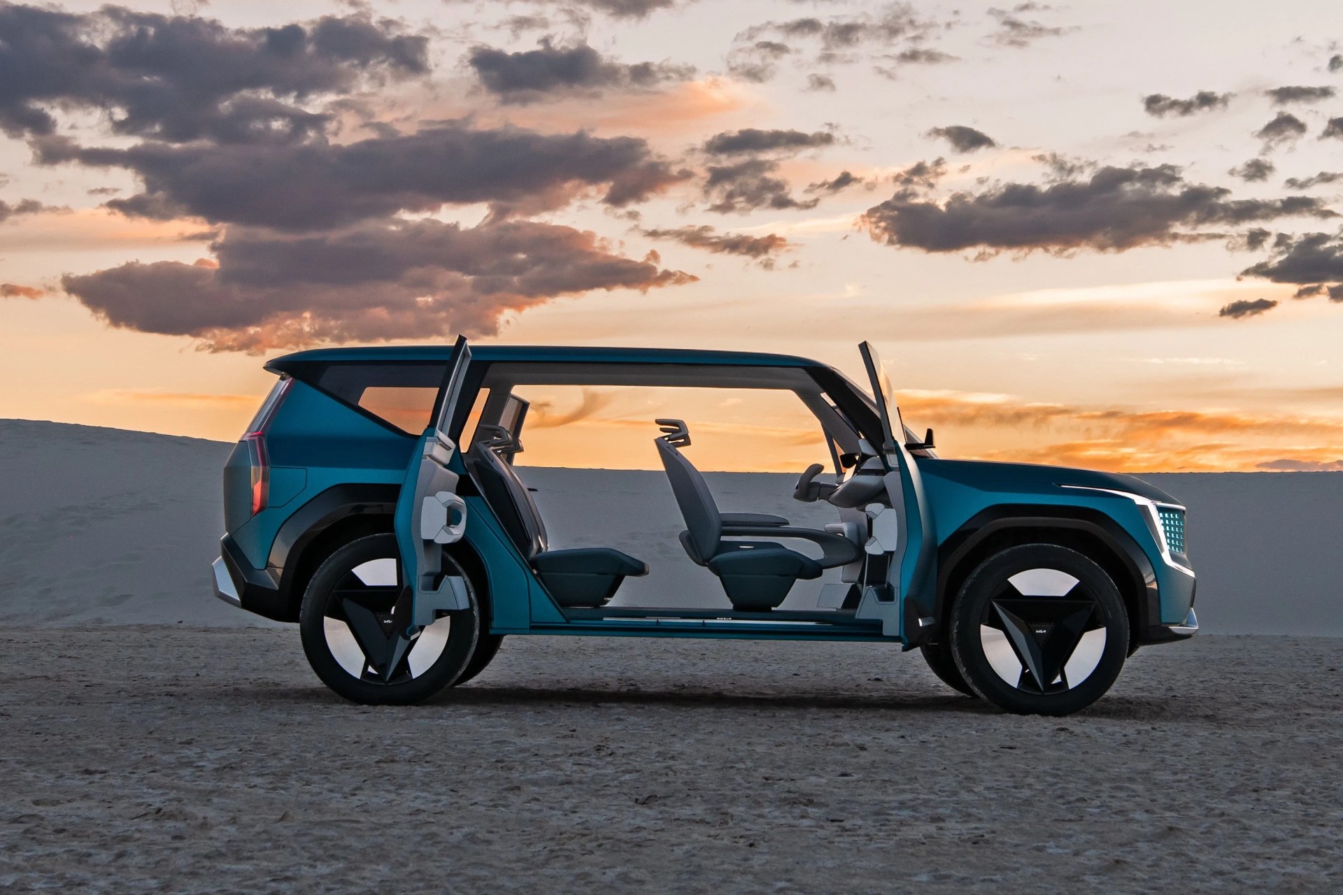 kia concept ev9 with doors open in the desert