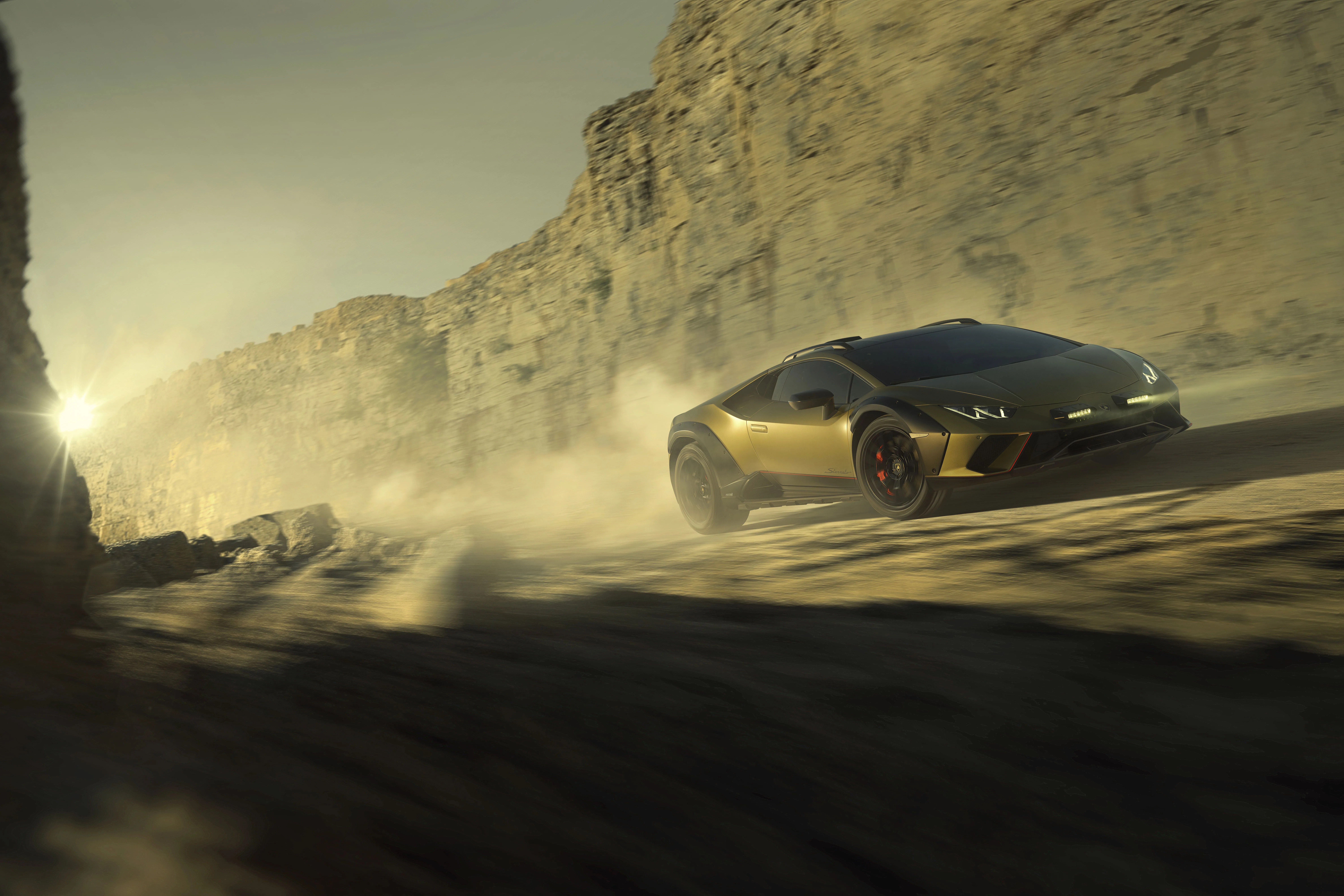 2023 lamborghini huracan sterrato driving through a desert