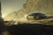 2023 lamborghini huracan sterrato driving through a desert