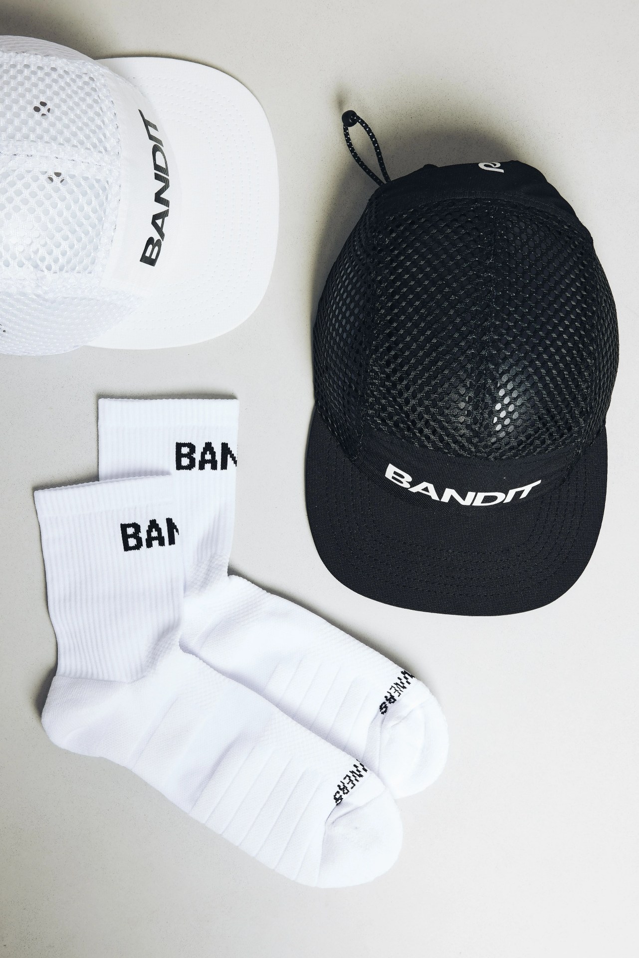 two hats and a pair of socks from bandit running