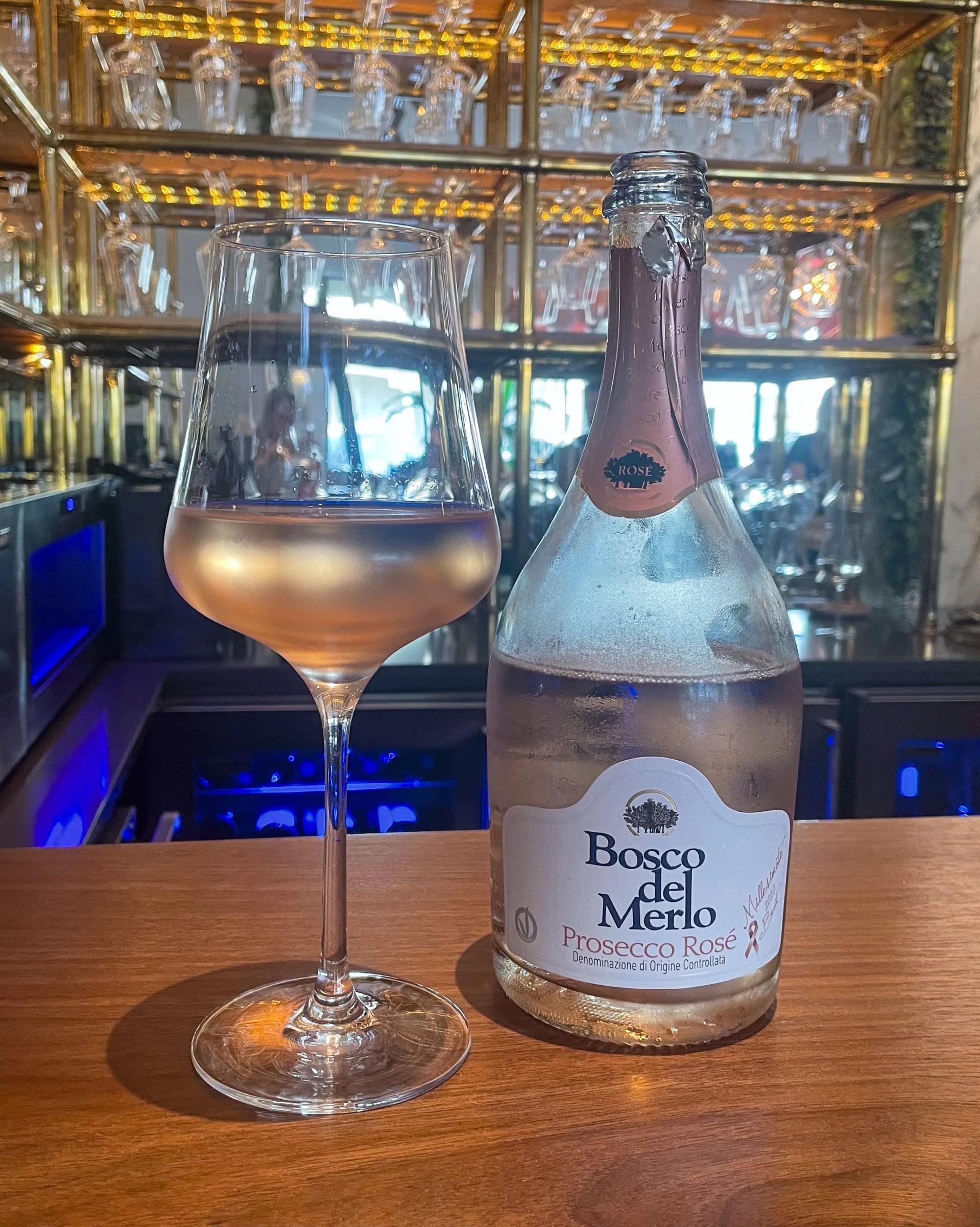 bottle and glass of bosco del merlo prosecco rose wine