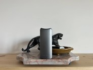 davinci artiq vape by an ashtray