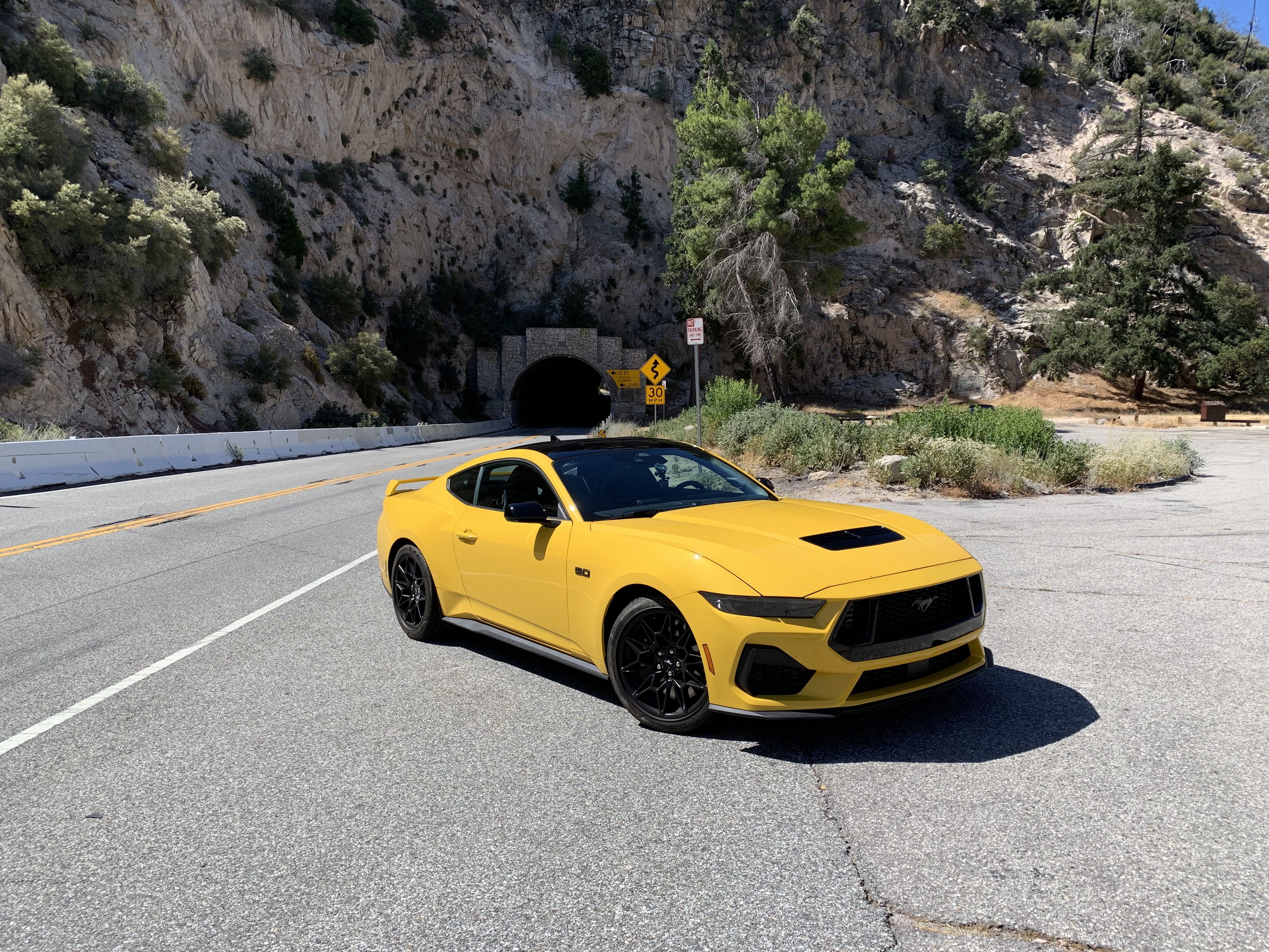 ford mustang gt parked outside of a tunnel