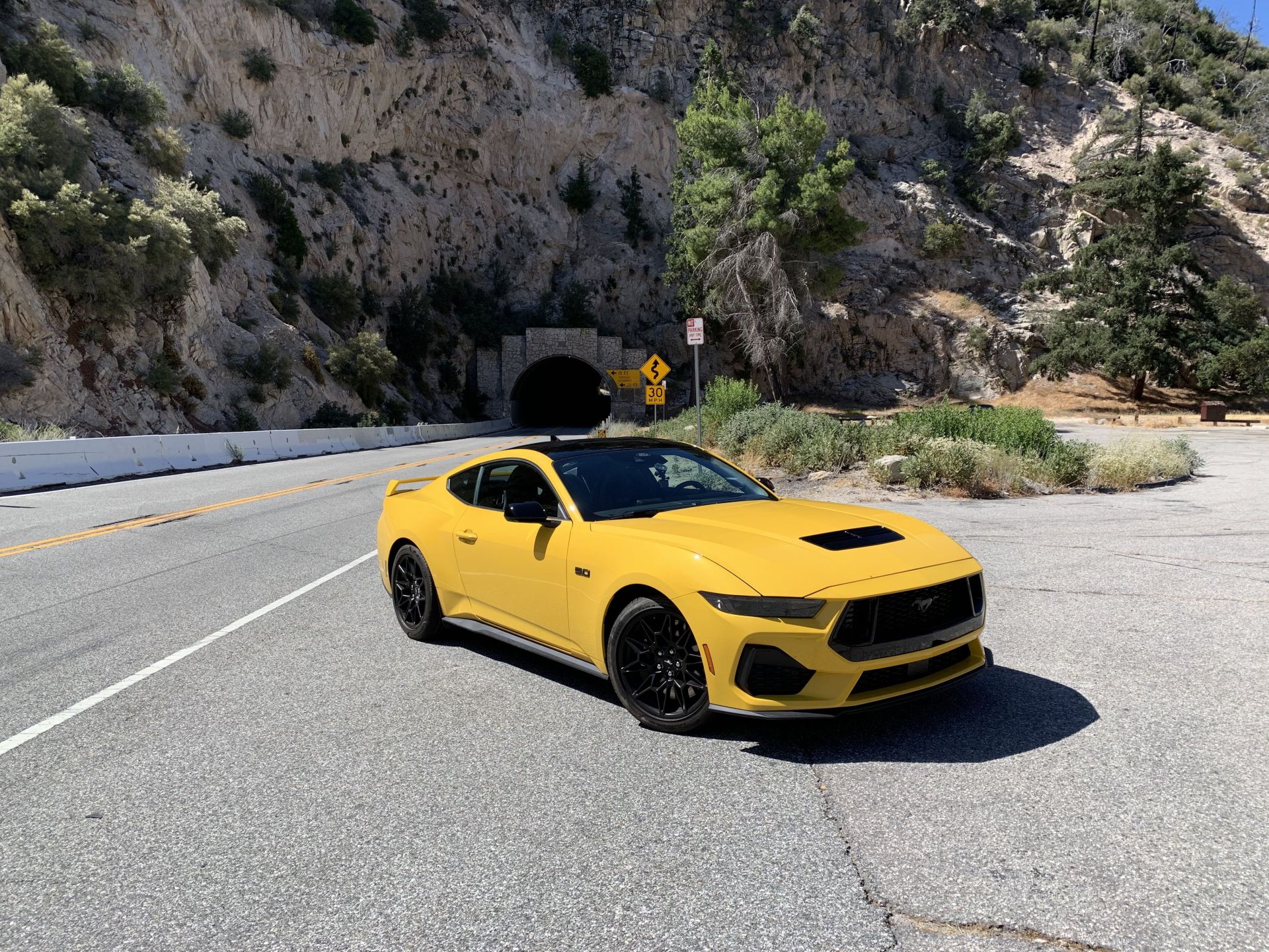 ford mustang gt parked outside of a tunnel