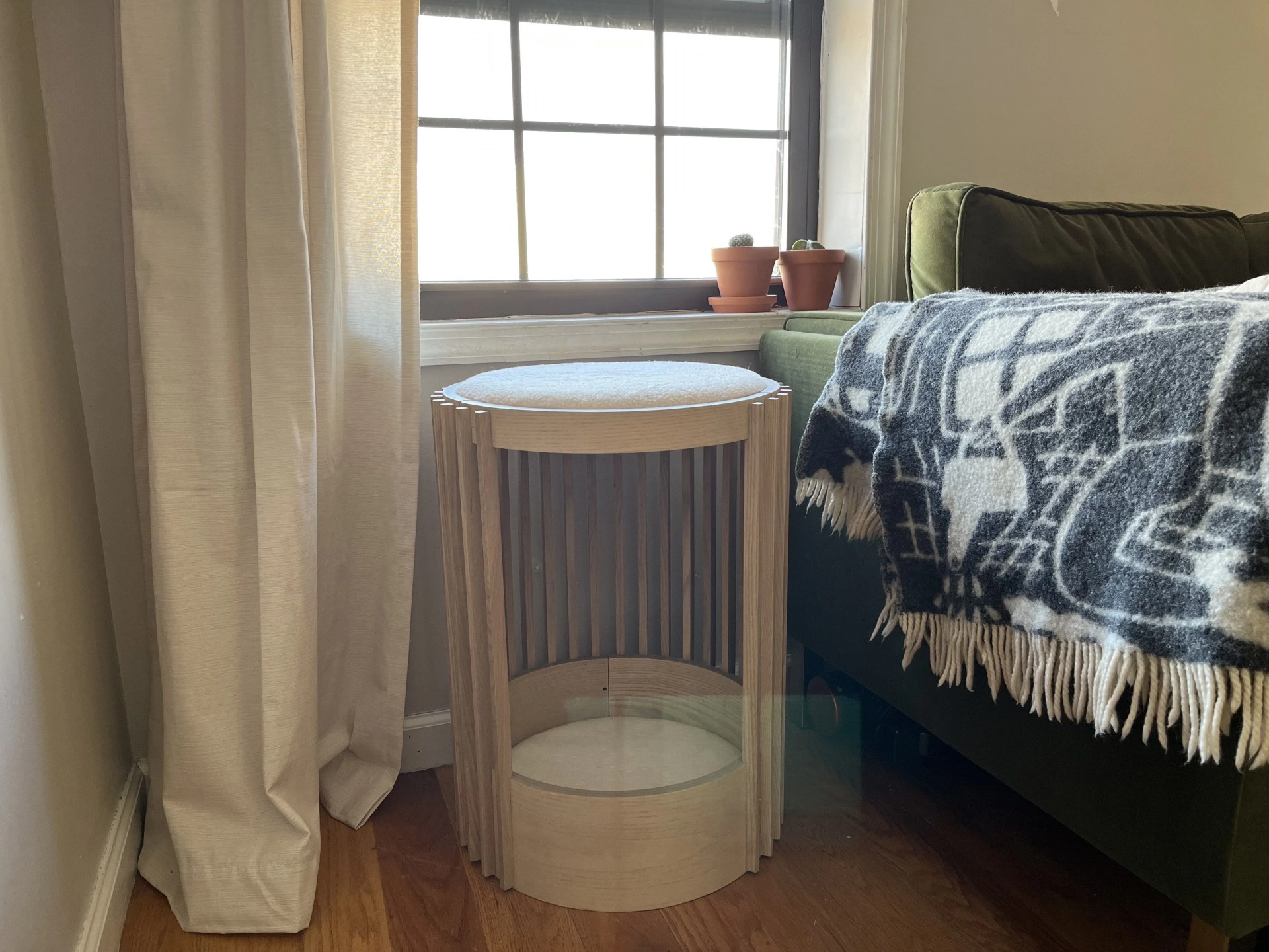 tuft and paw grove cat tower in a living room