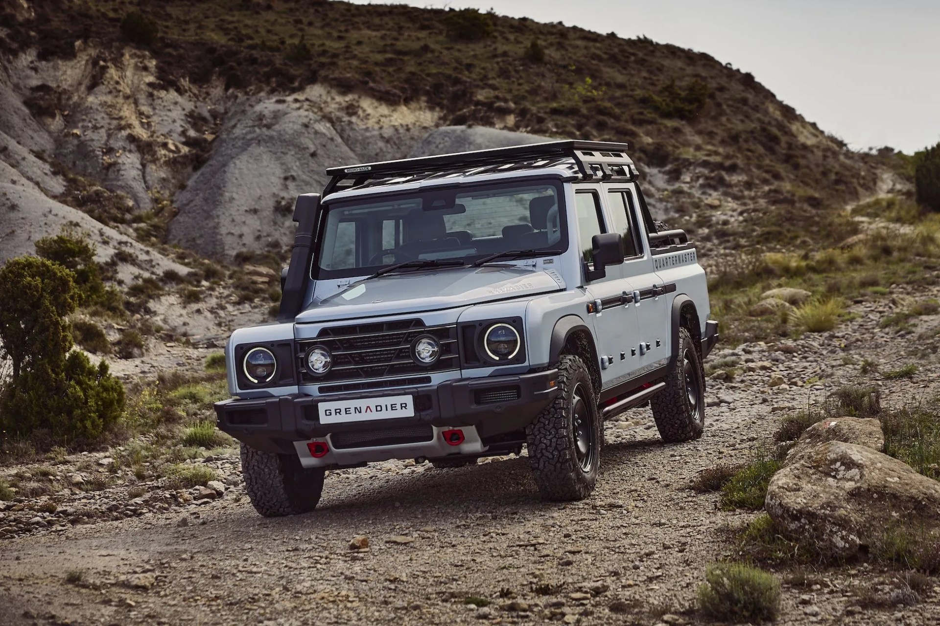ineos grenadier quartermaster driving on a dirt road