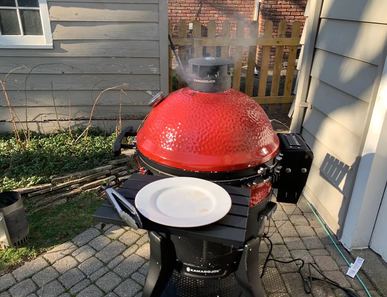 kamado joe grill on a patio